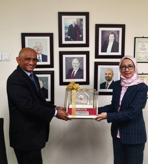 Portfolio manager Zahid Siddique and president Shahariah Binti Shaharudin hold the 2019 EPF Best International Equity Fund Manager Award.